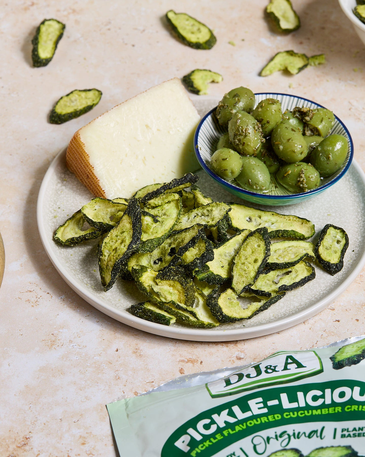 DJ & A Pickle-licious pack shown with a bowl of the crunchy pickle snack.